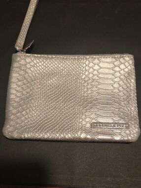 Rodan+ Fields Metallic Silver Snake-Embossed Wristlet